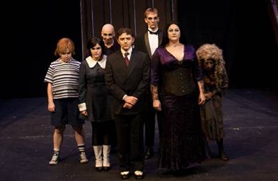 Students in Adams Family play.